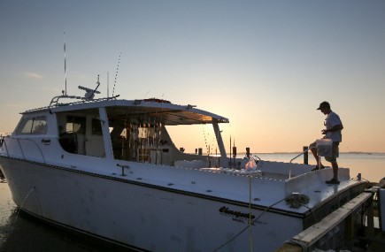 A fishing guide on Tilghman Island, Maryland, prepares to take guests fishing for rockfish on the Chesapeake Bay.