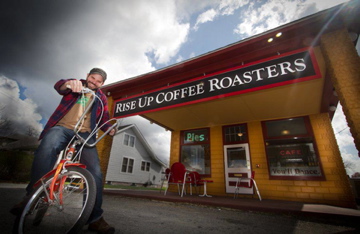 Rise Up Coffee Roasters store front entrance.